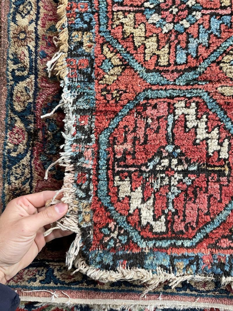 A genuine antique Persian rugthan 100 years old