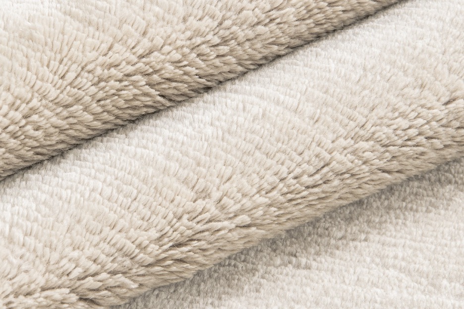 Sunlight Exposure on Silk RugContextual Caption: Direct sunlight accelerates silk fiber fading