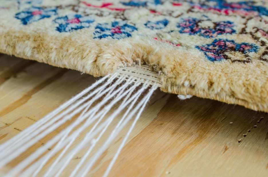 Antique rug fringe unraveling exposing structural warp threads
Image Title Attribute: Fringe Structural Exposure
